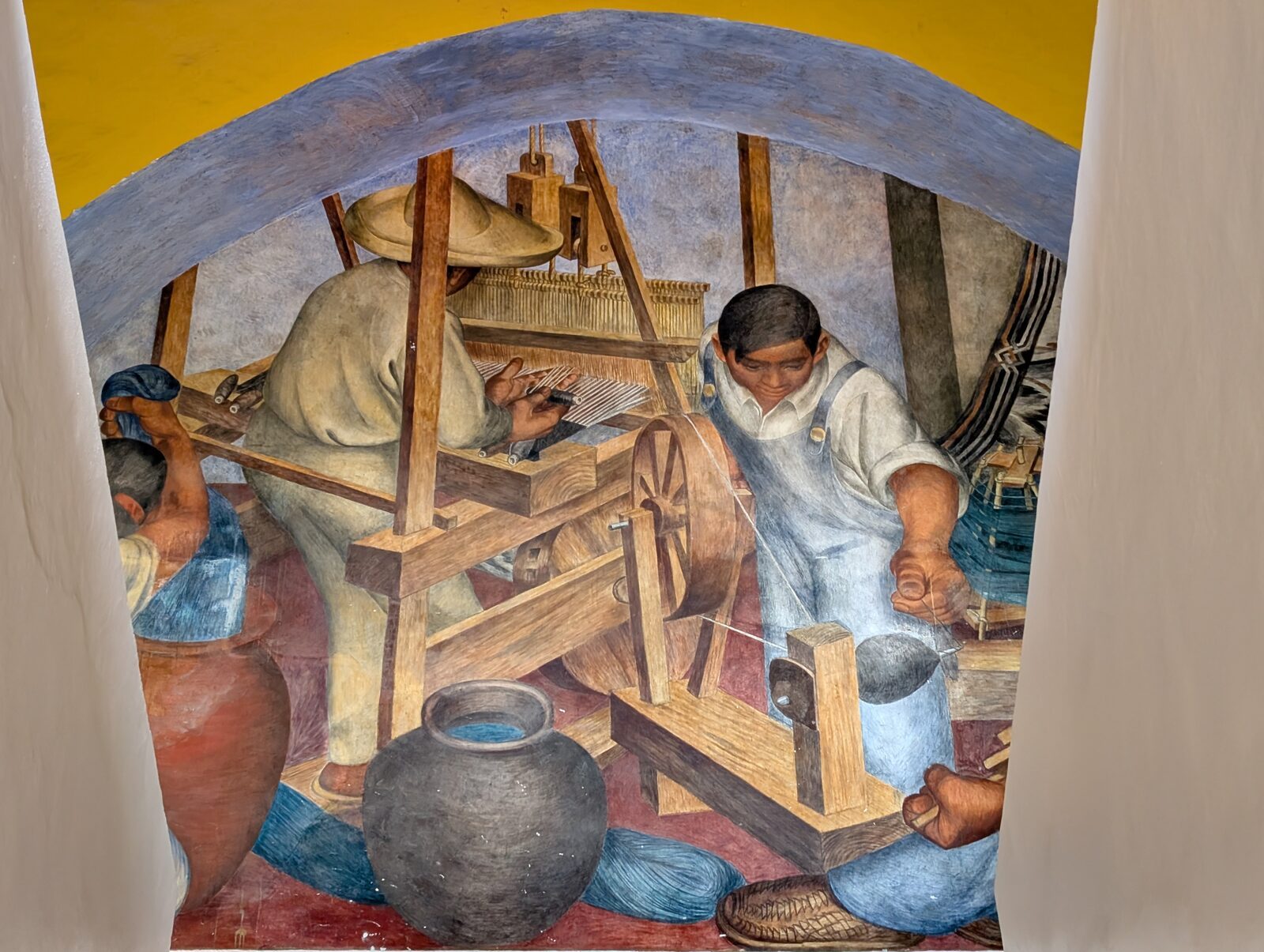 Tejedores en el telar