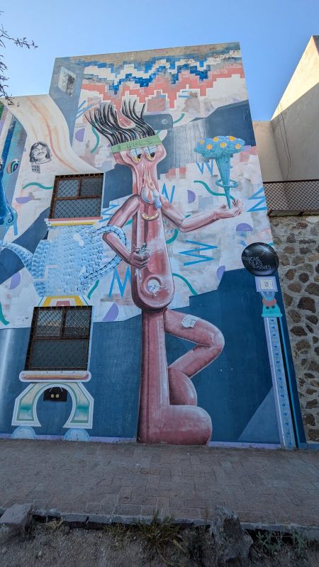 Elongated psychedelic figure
