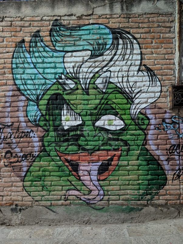 Green cartoon face