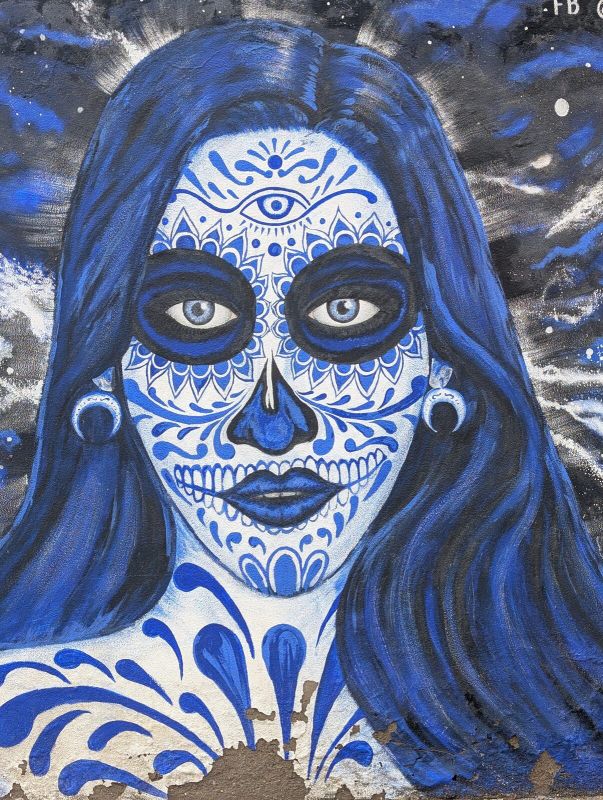 Mujer calavera azul