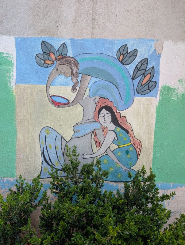 Three female figures