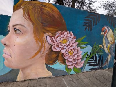 Woman with peonies and finch