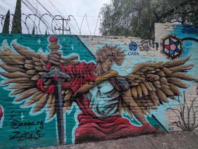 Winged warrior with sword