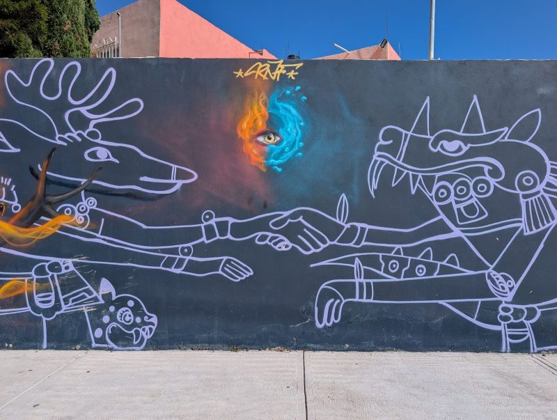 Deer and serpent handshake