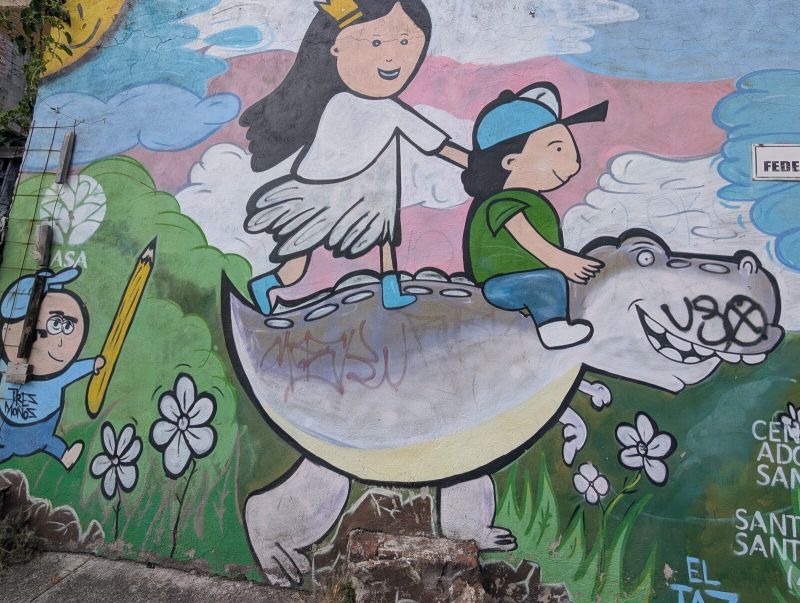 Children riding a creature