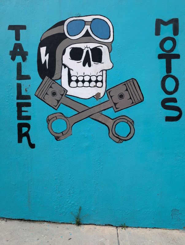 Motorcycle shop skull sign