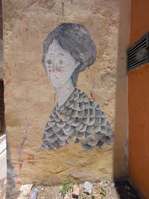 Woman in scalloped dress