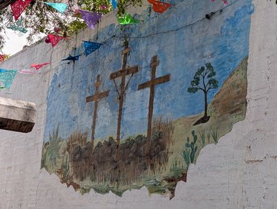 Three crosses on a hillside