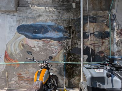 Two faces in hats