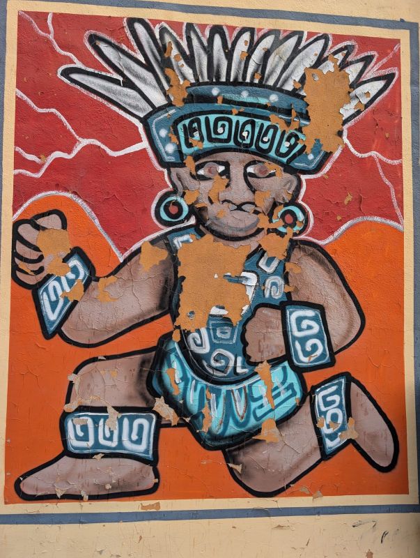 Kneeling Aztec figure