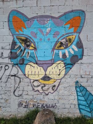 Cabeza de jaguar azul