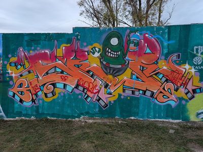 Grafiti con monstruo de un ojo