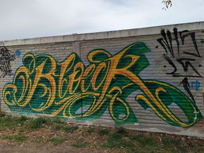 Letras verdes en cursiva